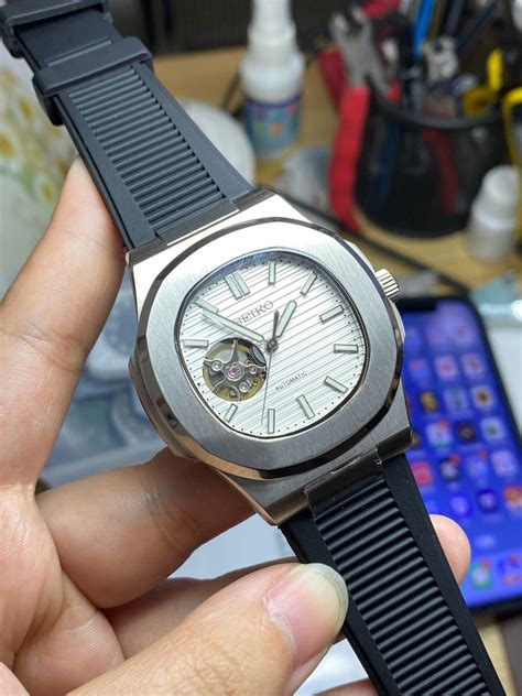 patek philippe nautilus open heart